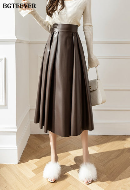 BGTEEVER Spring Autumn Loose PU Leather A-line Skirts Women Elegant High Waist Pleated Faux Leather Skirts Female