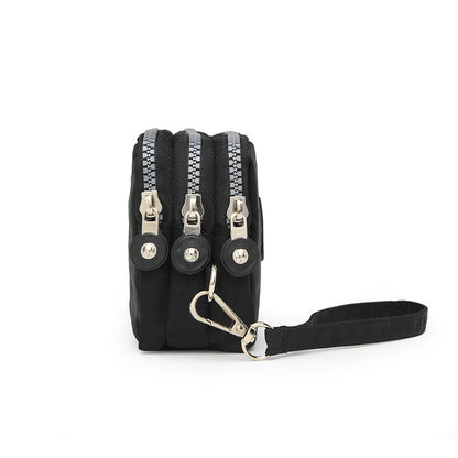 The 3-layer zipper clutch is lightweight, compact and versatile for ladies. It can be used with mobile phones or loose change