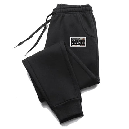 Calças de Moletom Masculinas e Femininas Casuais de Alta Qualidade Luxuosas Calças de Jogging Versáteis Macias Vendas Quentes Calças Estampadas com Elástico na Cintura