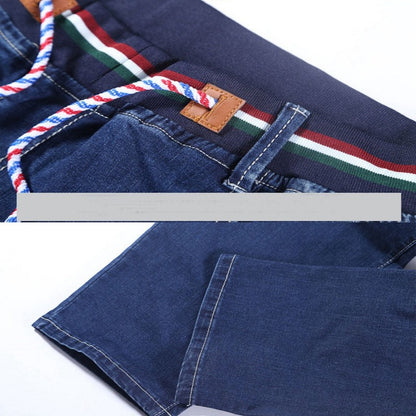 Autumn plus size casual jeans fashion men's pocket elastic waist straight plus size high elastic jeans.