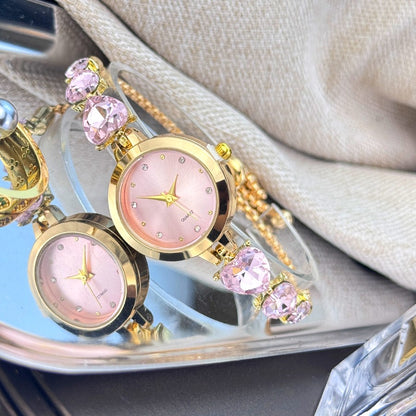 Ladies' quartz watch with three heart-shaped diamond-encrusted bracelet round alloy case and mixed scale simple light luxury