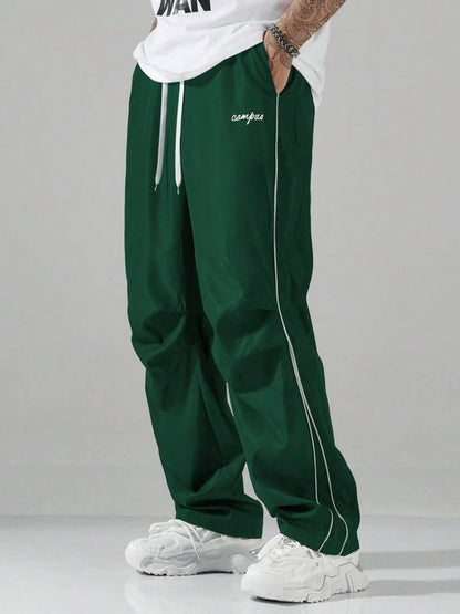 Men's Casual Letter Pattern Contrast Piping Drawstring Waist Trousers