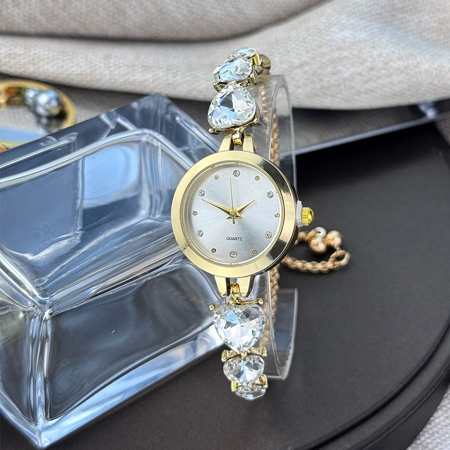 Ladies' quartz watch with three heart-shaped diamond-encrusted bracelet round alloy case and mixed scale simple light luxury