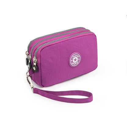 The 3-layer zipper clutch is lightweight, compact and versatile for ladies. It can be used with mobile phones or loose change