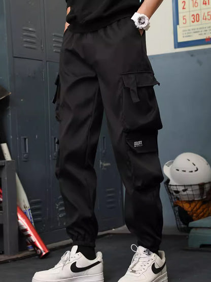 Spring and autumn windproof and waterproof outdoor pants, hiking workwear pants for men, loose and thin underwear for men and wo