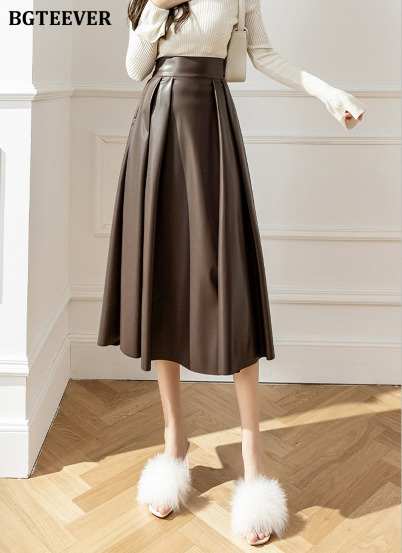 BGTEEVER Spring Autumn Loose PU Leather A-line Skirts Women Elegant High Waist Pleated Faux Leather Skirts Female