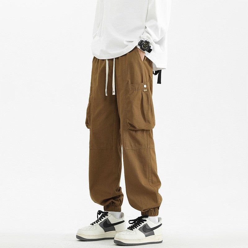 Calça Jogger Solta Multibolsos para Primavera Verão, Calça Casual Masculina Estilo Urbano com Cordão na Cintura, Calça Cargo para Fitness e Atividades ao Ar Livre