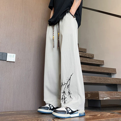 Novas Calças de Seda Gelo Chinesas Masculinas Verão Fina Solta Perna Larga Marca de Moda Seda Gelo Estilo Chinês Calças Casuais Bordadas Frescas