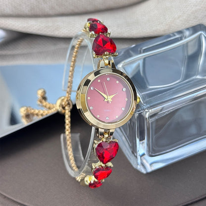 Ladies' quartz watch with three heart-shaped diamond-encrusted bracelet round alloy case and mixed scale simple light luxury