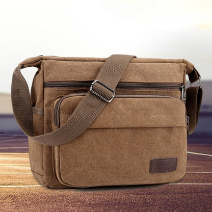 1 men's retro canvas crossbody bag, casual travel shoulder bag, outdoor sports shoulder bag with adjustable shoulder strap