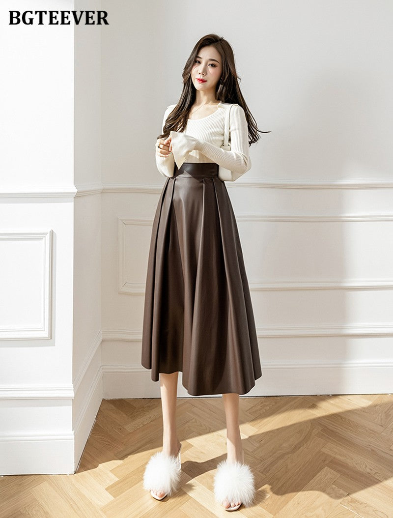 BGTEEVER Spring Autumn Loose PU Leather A-line Skirts Women Elegant High Waist Pleated Faux Leather Skirts Female