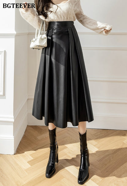 BGTEEVER Spring Autumn Loose PU Leather A-line Skirts Women Elegant High Waist Pleated Faux Leather Skirts Female