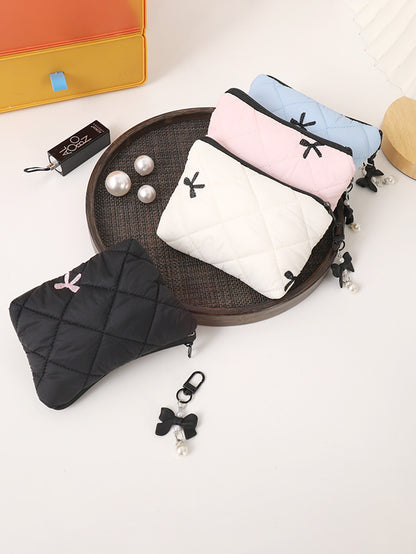 Simple bow quilted clutch, portable everyday small item pouch for lipstick, earphones, and change, soft travel makeup bag