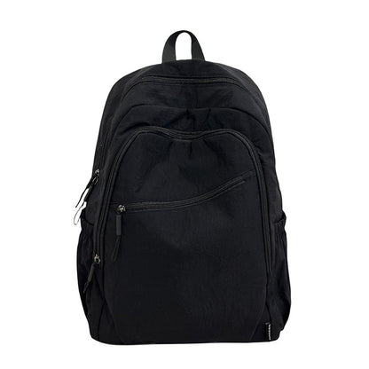 Backpack, large capacity, adjustable shoulder straps, suitable for school, campus travel, and work, with a secure zipper closure