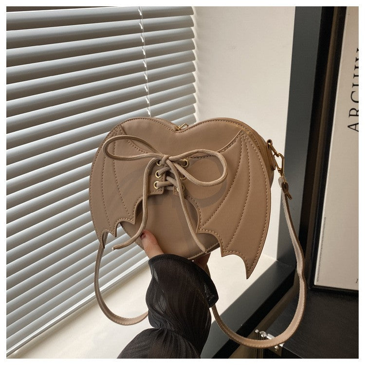 New trendy and personalized wing shoulder bag, versatile ins crossbody shaped bag New trendy and personalized wing shoulder bag,