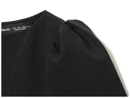 Women's black short puff sleeve mini dress with a stylish boat neckline design and pocket details, suitable for elegant occasion