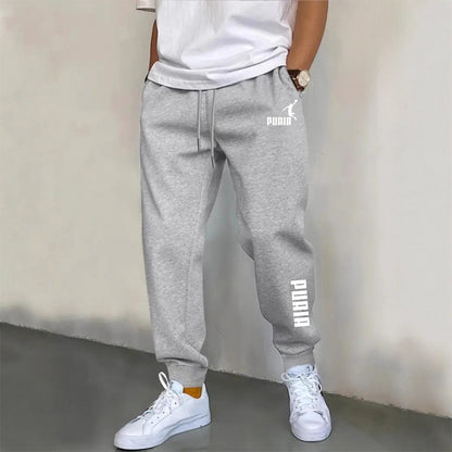 Roupa de exercício masculina. Calças esportivas casuais 2026 para esportes ao ar livre, com design de cós elástico, corte reto solto e confortável.