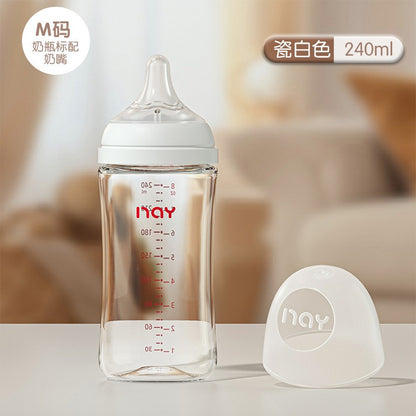 Newborns' wide caliber anti choking glass milk bottle 0-3 months bottle straight body newborn baby bottle