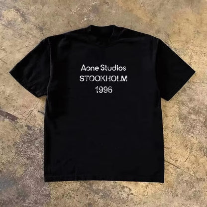 Roupas masculinas Unissex Tendência de verão Moda Marca de luxo Camiseta com letras estampadas Camiseta de algodão masculina e feminina Manga curta