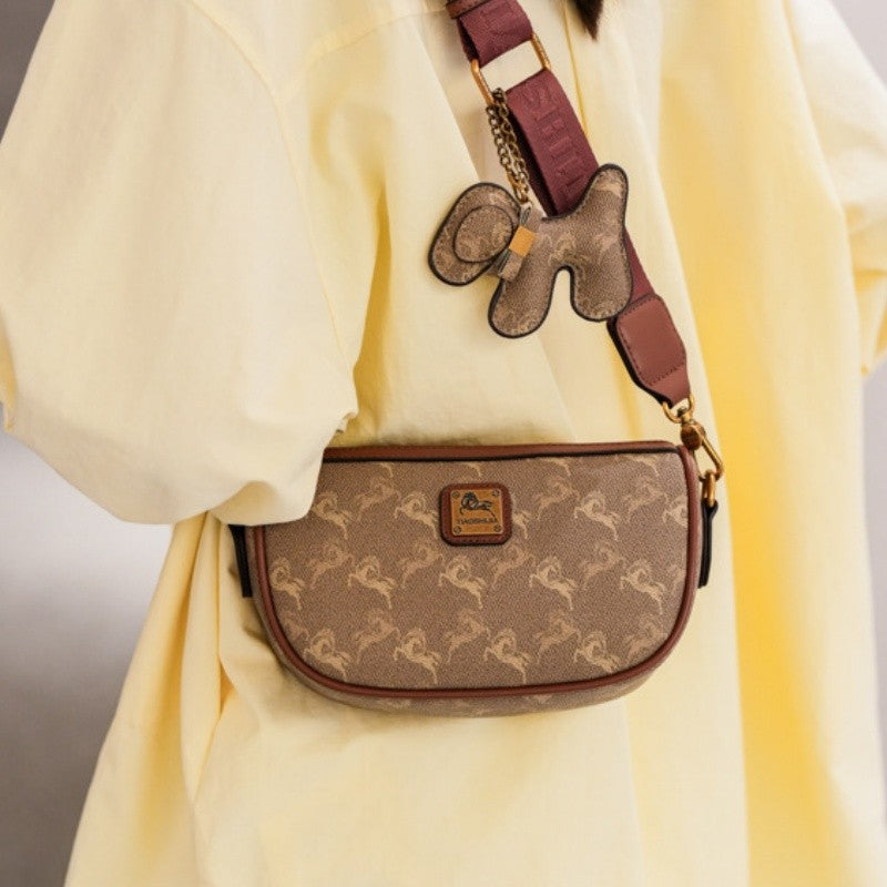 Classic style handbag with strap, featuring a shoulder-sling design, suitable for women, with a bag shape resembling