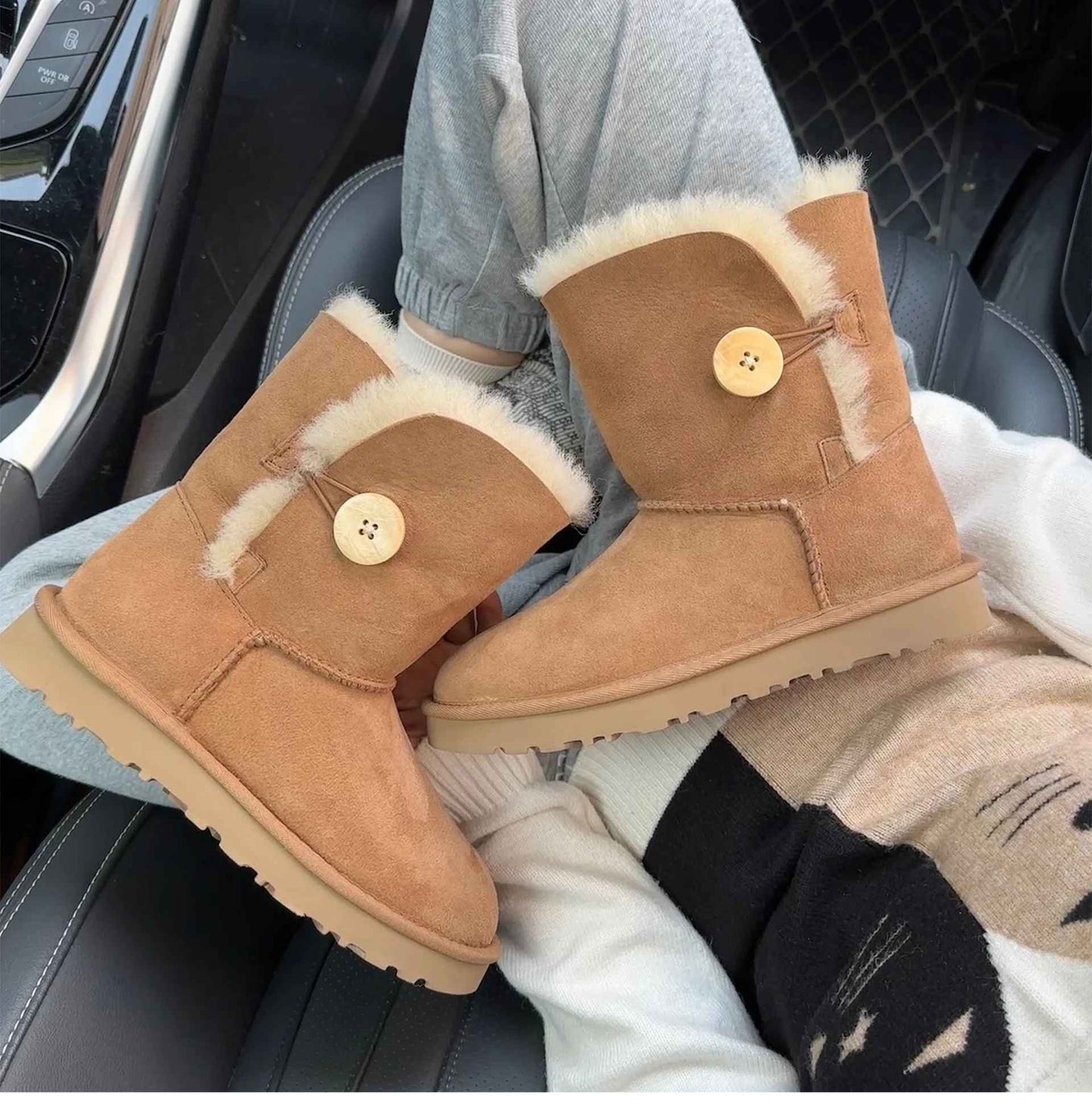 A pair of pure sheepskin and wool winter snow boots for women, warm and comfortable. Simple and fashionable women's shoes