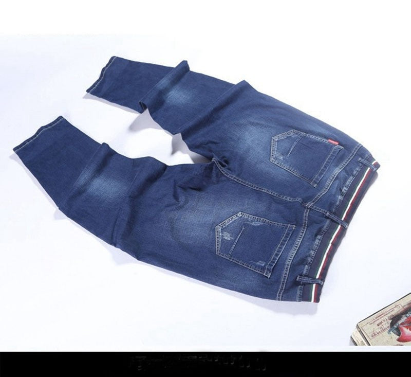 Autumn plus size casual jeans fashion men's pocket elastic waist straight plus size high elastic jeans.