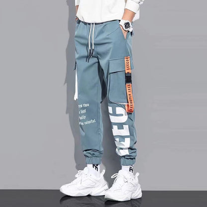 Calças Cargo Masculinas Casuais High Street com Cordão na Cintura Soltas Multi Bolsos Moda Perna Reta Confortáveis