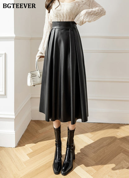 BGTEEVER Spring Autumn Loose PU Leather A-line Skirts Women Elegant High Waist Pleated Faux Leather Skirts Female