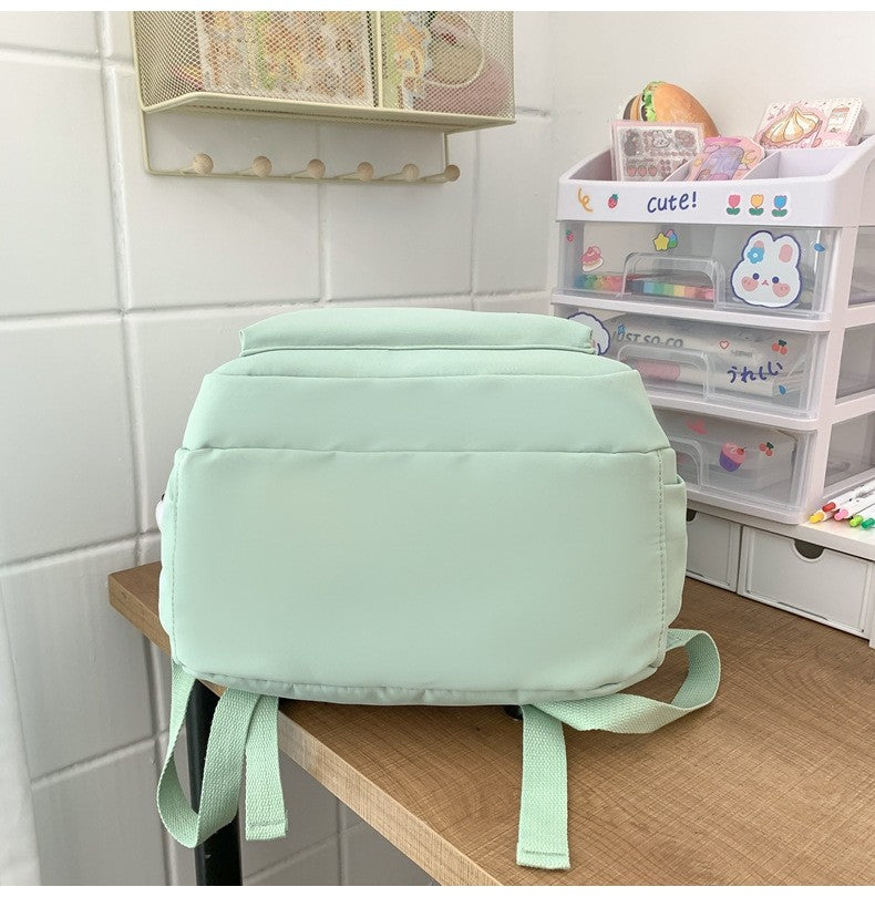 Schoolbags Student Japanese And Versatile Backpack Unisex Large-Capacity Backpack Girl Simple Polyester Material Doll Decoration