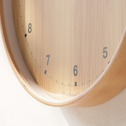 The original wood grain silent and simple wooden wall clock is a fashionable home decoration for the living room clock