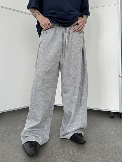 European and American men's waist trousers waist drawstring straight wide-leg loose trousers sports trousers pocket men pants