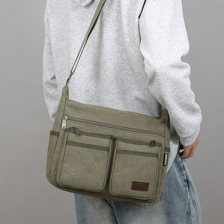 Neutral business casual crossbody bag - adjustable shoulder straps, multiple zippered compartments, durable black polyester lini