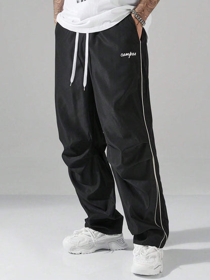 Men's Casual Letter Pattern Contrast Piping Drawstring Waist Trousers