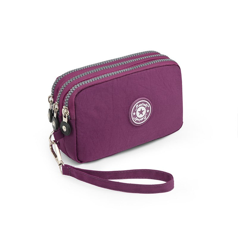 The 3-layer zipper clutch is lightweight, compact and versatile for ladies. It can be used with mobile phones or loose change