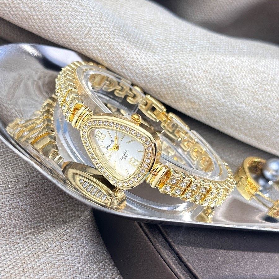 Women's diamond-set snakehead alloy case Sun stripe stripe scale diamond-set fine bracelet quartz watch luxury women's watch