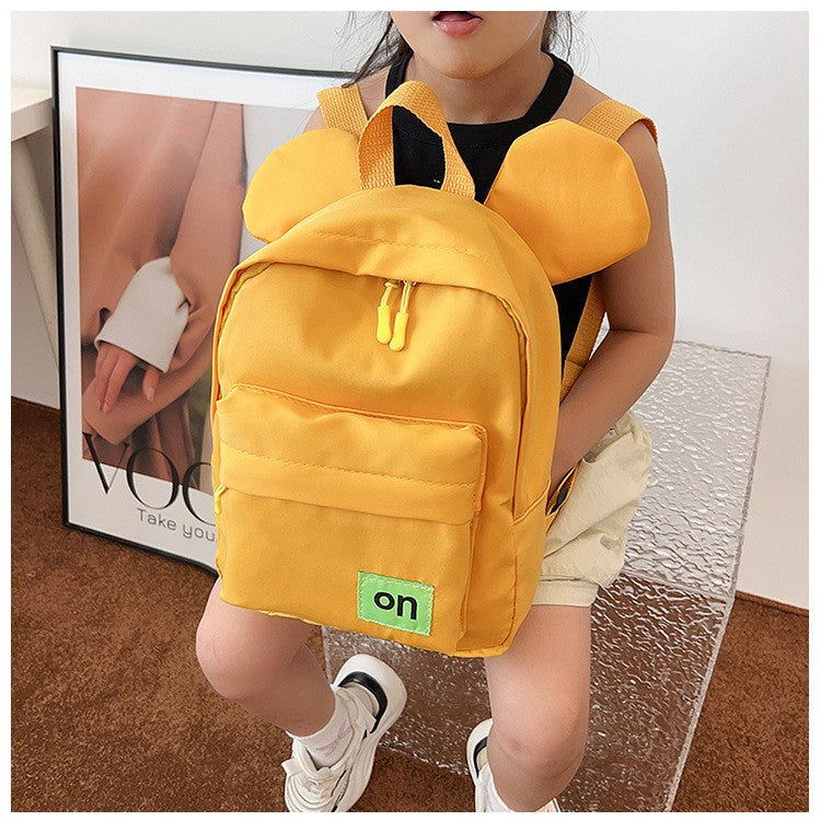 Mochila infantil fofa estilo novo para meninos e meninas estudantes do jardim de infância mochila escolar casual de cor sólida