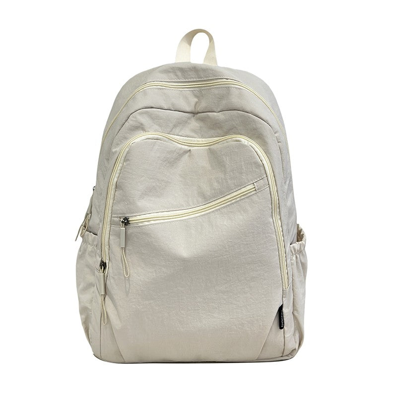 Backpack, large capacity, adjustable shoulder straps, suitable for school, campus travel, and work, with a secure zipper closure