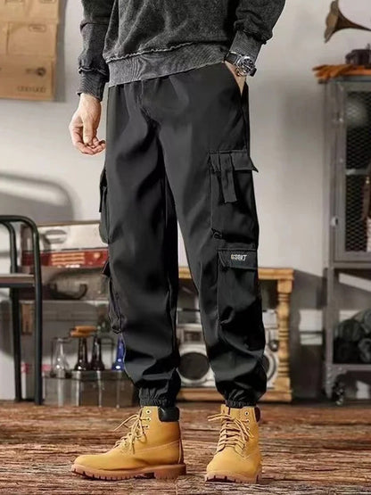 Spring and autumn windproof and waterproof outdoor pants, hiking workwear pants for men, loose and thin underwear for men and wo