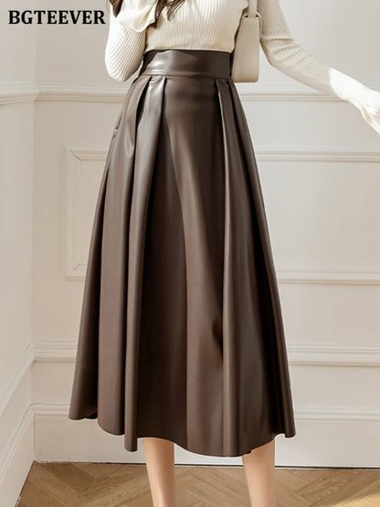 BGTEEVER Spring Autumn Loose PU Leather A-line Skirts Women Elegant High Waist Pleated Faux Leather Skirts Female