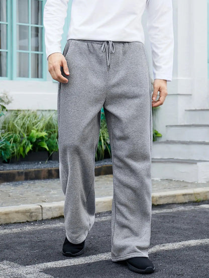 European and American men's waist trousers waist drawstring straight wide-leg loose trousers sports trousers pocket men pants
