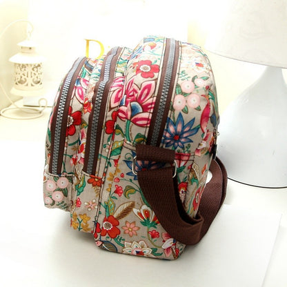 Women's nylon shoulder bag with floral print and multiple compartments, casual crossbody bag