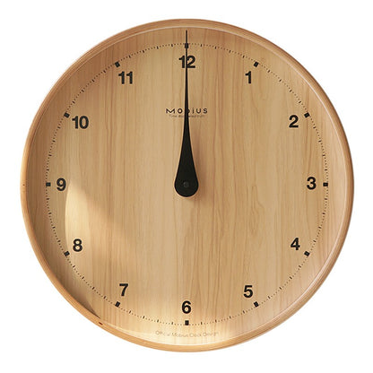 The original wood grain silent and simple wooden wall clock is a fashionable home decoration for the living room clock