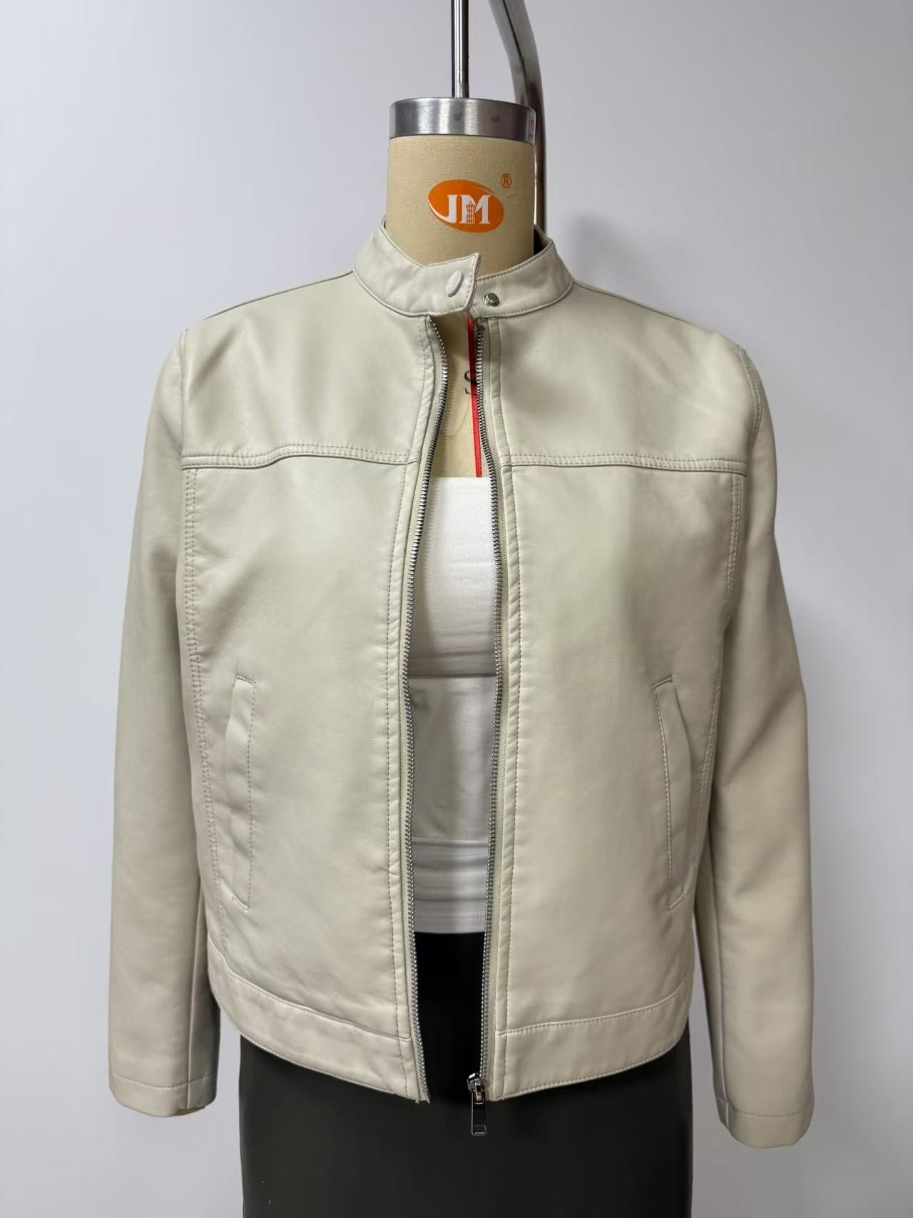 Black Women's Fitted Leather Jacket with Front Zipper & Side Pockets?, Available in Brown, Navy Blue, and Beige.