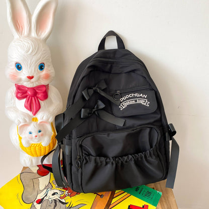 Mochila com Laço Fofo Bordado com Letras de Nylon para Escola Grande Capacidade Zíperes Duplos Alças Ajustáveis Volta às Aulas
