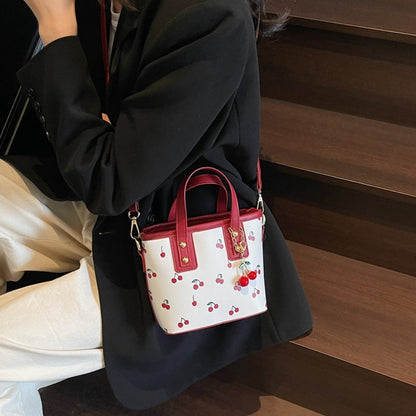 Women PU Cherry Shoulder Bag Large Capacity Trendy Commuting Bag with Cherry Pendant Stylish Crossbody Bag Aesthetic Handbag