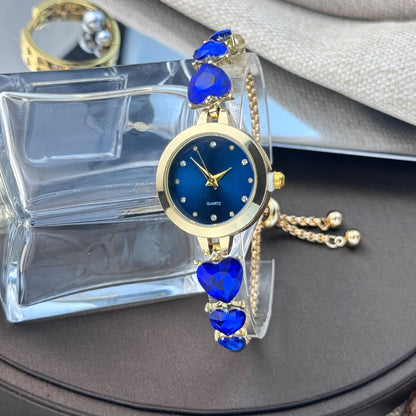 Ladies' quartz watch with three heart-shaped diamond-encrusted bracelet round alloy case and mixed scale simple light luxury