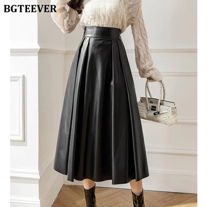 BGTEEVER Spring Autumn Loose PU Leather A-line Skirts Women Elegant High Waist Pleated Faux Leather Skirts Female