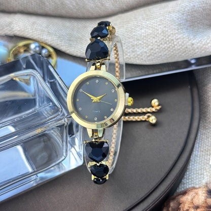 Ladies' quartz watch with three heart-shaped diamond-encrusted bracelet round alloy case and mixed scale simple light luxury