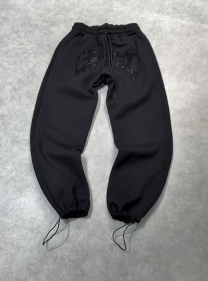 Calça Jogger Y2K Retrô Gótico Hip Hop com Strass Bordado Casual Masculina Feminina Calça Folgada Moda com Tira no Tornozelo