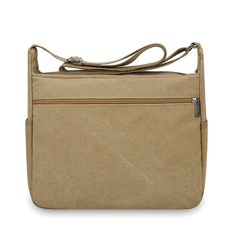 Neutral business casual crossbody bag - adjustable shoulder straps, multiple zippered compartments, durable black polyester lini